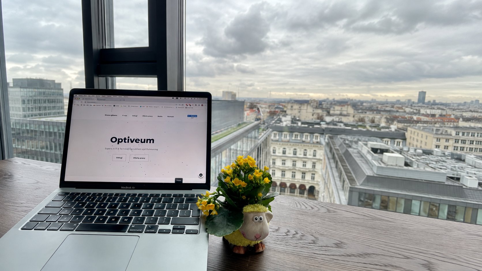 Optiveum office overlooking the Warsaw skyline